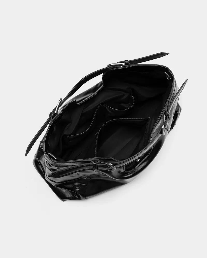 Black oily leather motorcycle-style bag