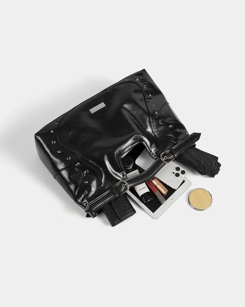 Black oily leather motorcycle-style bag