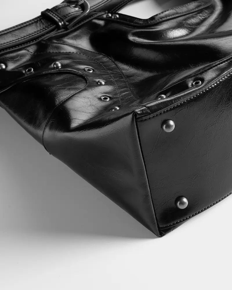 Black oily leather motorcycle-style bag